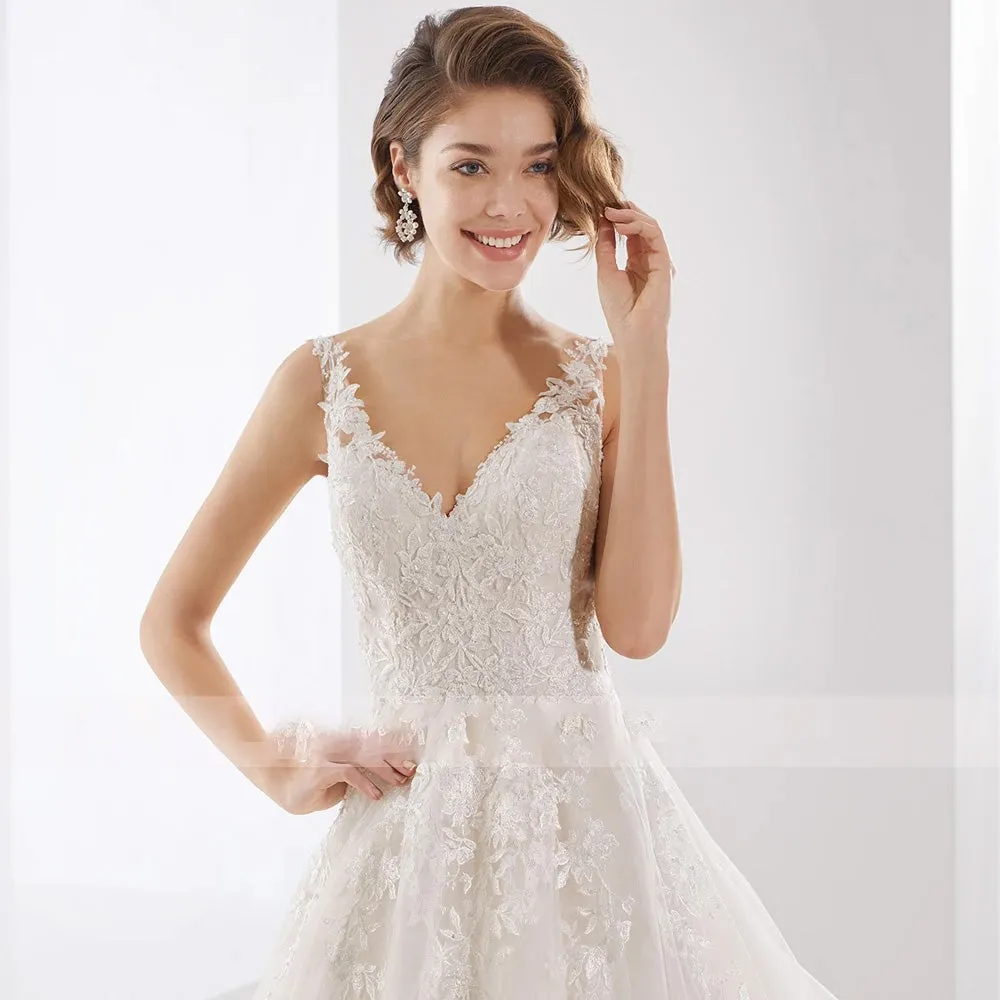 Sweetheart A-Line Wedding Dresses Sexy Backless Appliques Beaded Court Train Tulle Bride Gown